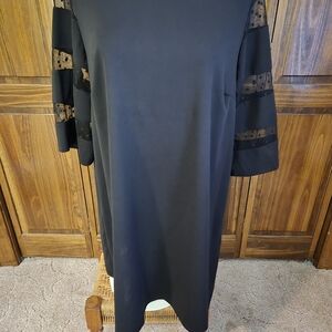 Elegant Black Dress with Sheer Accents